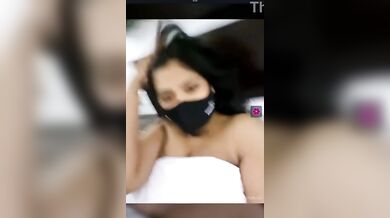 Indian girl in courtship lowers towel while video call