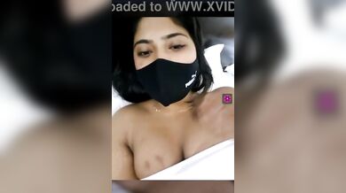 Indian girl in courtship lowers towel while video call