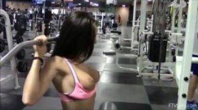 Public gym teasing girl wearing pink bra and panties