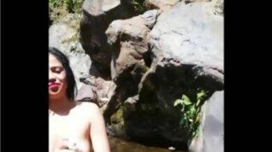 The girl fingers her BF and fucks him in nature