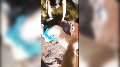 The girl fingers her BF and fucks him in nature