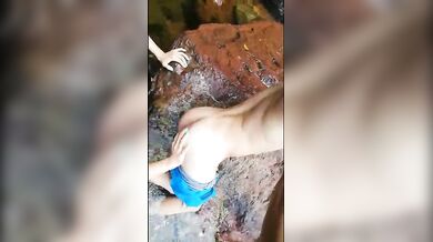 The girl fingers her BF and fucks him in nature