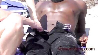 Busty Spanish milf takes a BBC on a public beach