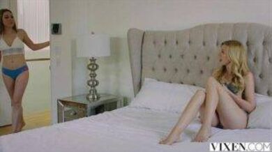 A blonde girl enjoys a passionate threesome with a young couple