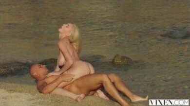 Busty blonde GF fucks the sailer on the beach