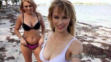 Two horny girls fucks a pervert on the lonely beach