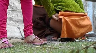 Enjoy Indian girl pissing in outdoor
