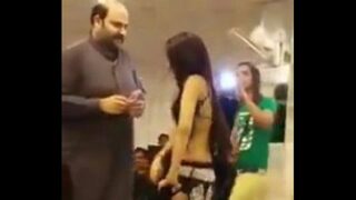 Pakistani dancer doing mujra at a party