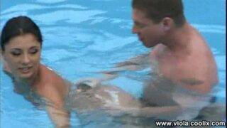 A dirty wife gets double penetrated in a public swimming pool