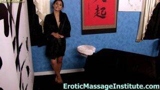 A young girl gets an erotic massage in the parlor